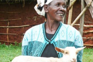 lady holding a goat